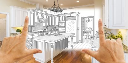 two hands point at a drawing of a kitchen.